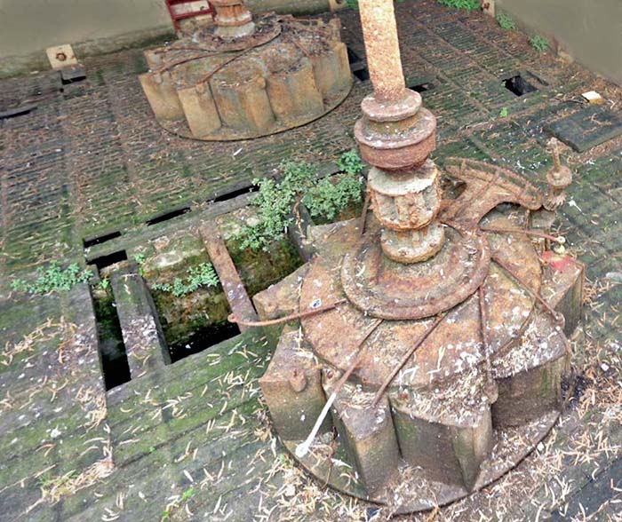 The historic remains of two water turbines that used to power the Yarra Falls Flour Mill, in Dights Falls Reserve in Victoria.