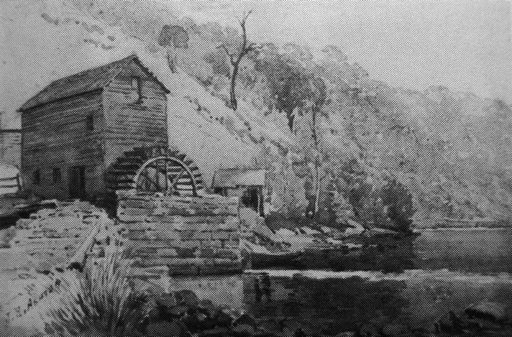 A painting, possibly in 1886, by Julian Rossi Ashton showing James Singleton's watermill at Laybury Creek, Wisemans Ferry