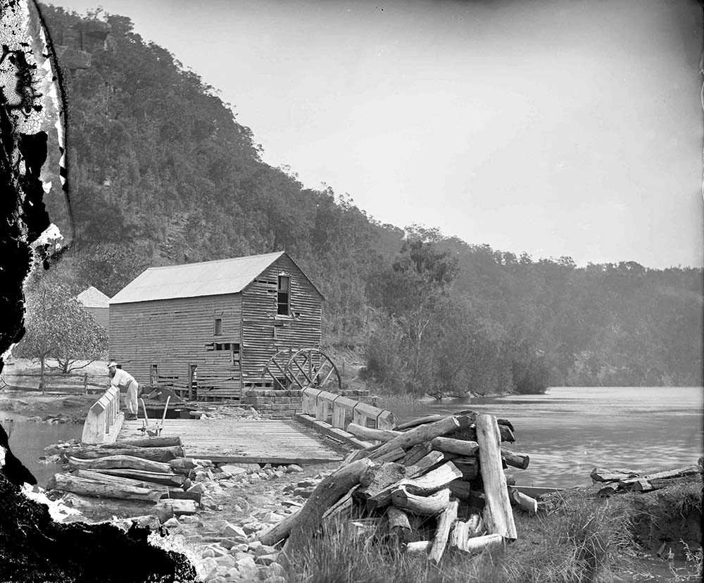 A photograph by William Hall of Singletons  Mill and the adjoining bridge over Laybury Creek, Wisemans Ferry NSW